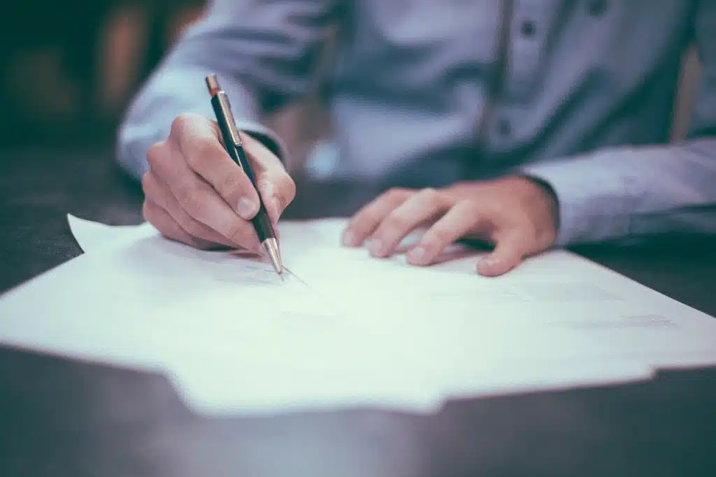 person writing document